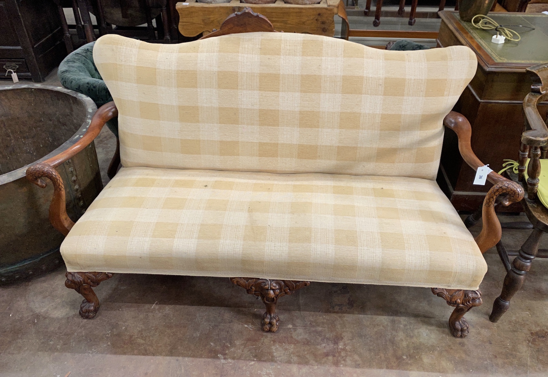 An 18th century style mahogany two seater settee with scroll swan neck arms, width 160cm, depth 60cm, height 86cm